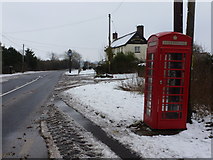 SY8997 : Winterborne Zelston: phone box on the A31 by Chris Downer