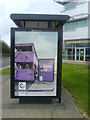 Bus shelter with 2011 census poster