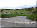 Access road linking a converted barn to the Mill Road