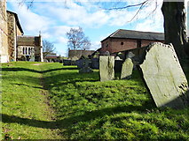 SP6798 : Gravestones at St. Andrew's Church by Mat Fascione