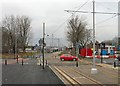 SJ8798 : Metrolink crossing Clayton Lane by Gerald England