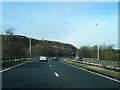 A56 northbound crosses the B6232 Grane Road