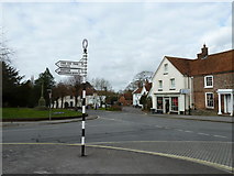SU5258 : Signpost in Kingsclere village centre by Basher Eyre