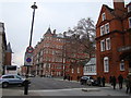 View of a striped building on Prince Consort Road from Exhibition Road