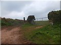 Farm track and field gate at Bowden Cross