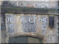 Wells: 115-year-old wording on the old post office