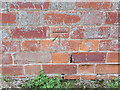 Bench mark on the church of St Lawrence, Atwick