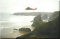 SW8469 : Air/sea rescue helicopter over Bedruthan Steps by John Baker