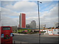 View of new flats on Barking Road from the top deck of a DLR replacement bus