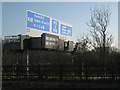 SP1272 : M42 junction 3a west: signage by Robin Stott