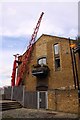 Old crane on a converted warehouse