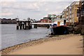 Houseboat and pier by the Thames