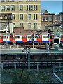 London Underground Train leaving High Street Kensington Station