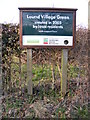 TM5098 : Lound Village Green sign by Geographer