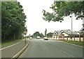 A mini-roundabout where Church Road meets Bent Lane