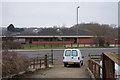 Van on footbridge