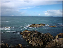 NM2625 : Tidal rocks and reefs, north west coast of Iona by Karl and Ali