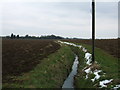 Drainage ditch with snow