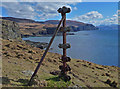 NG1939 : Fence post on the Duirinish cliff top by John Allan