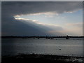 SZ1891 : Hengistbury Head: sunbeams over Christchurch Harbour by Chris Downer