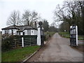 Lodge and gate pillars at the entrance to Llangibby Castle estate