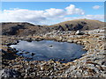 NB1702 : A small lochan on Goromul by Mike Dunn