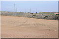 Arable field and pylons