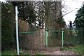 Iron gate and railings across footpath entrance