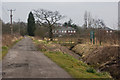 The bridge gives access to land planted for The Mersey Forest at Moss Side