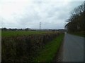 Long view west on New Road to the junction with the A29