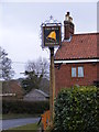 TG1309 : The Bell Public House sign by Geographer