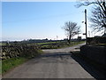 Ballyveaghmore Road at the junction with Longstone Road