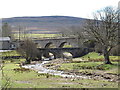 Burnstones Viaduct (east side) and A689 road bridge