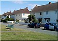 Ceri Road houses and a bench, Rhoose