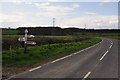 ST2243 : West Somerset : Road & Signpost by Lewis Clarke