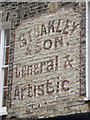 Faded shop sign - Green Street