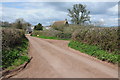 Country road passing Upper House