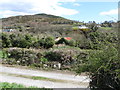 Ruined tin-roofed sheds above the Forkhill River