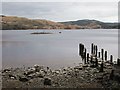 NM8803 : Beach, ruined pier and crannog by Patrick Mackie