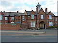 The former Wigmore School & Workhouse - front entrance and stables