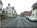 High Street passes The Plough Inn