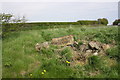 The remains of the Ainderby Steeple village name stone