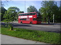 TQ2589 : 102 bus stopping on Falloden Way by David Howard