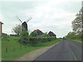 TQ8331 : B2086 passes Rolvenden Windmill by Stuart Logan