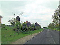 TQ8331 : B2086 passes Rolvenden Windmill by Stuart Logan