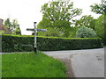 TQ5023 : Sign post for Nans Tuck Lane on Nans Tuck Lane by Dave Spicer
