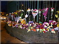 TQ4378 : Floral tributes on the corner of Artillery Place and John Wilson Street by Marathon