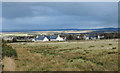 Field and houses west of Tain