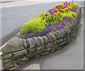 Canoe-shaped flower bed