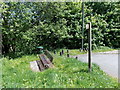 Bench, litter bin and signpost at the NW end of Usk Road, Bargoed
